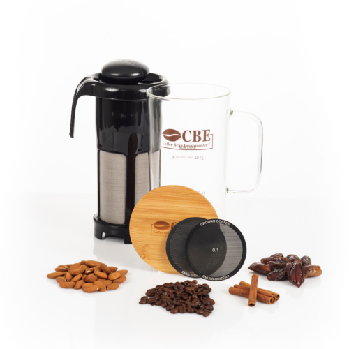 cbe essence coffee maker with some seeds, coffee beans and dates